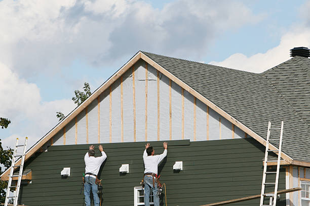 Professional Siding Installation technician working in Dunbar, PA